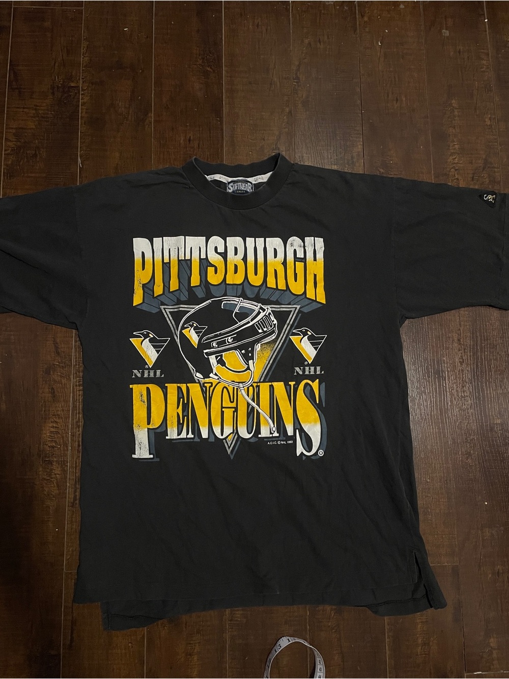NHL Pittsburgh Penguins Black Short Sleeve Tee with Yellow & White Graphics